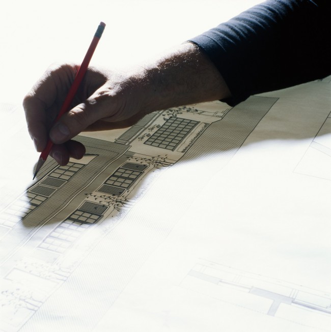 Man drawing with pencil, elevated view