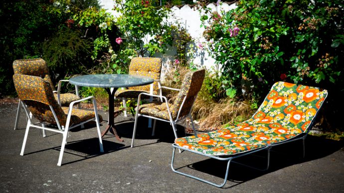 Retro garden furniture from the 70 ties in garden. Denmark