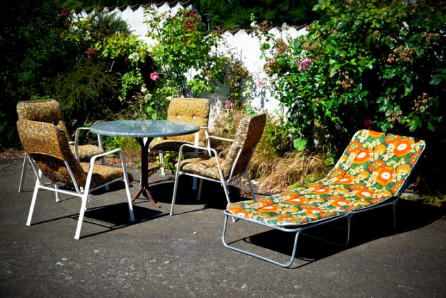 Retro garden furniture from the 70 ties in garden. Denmark